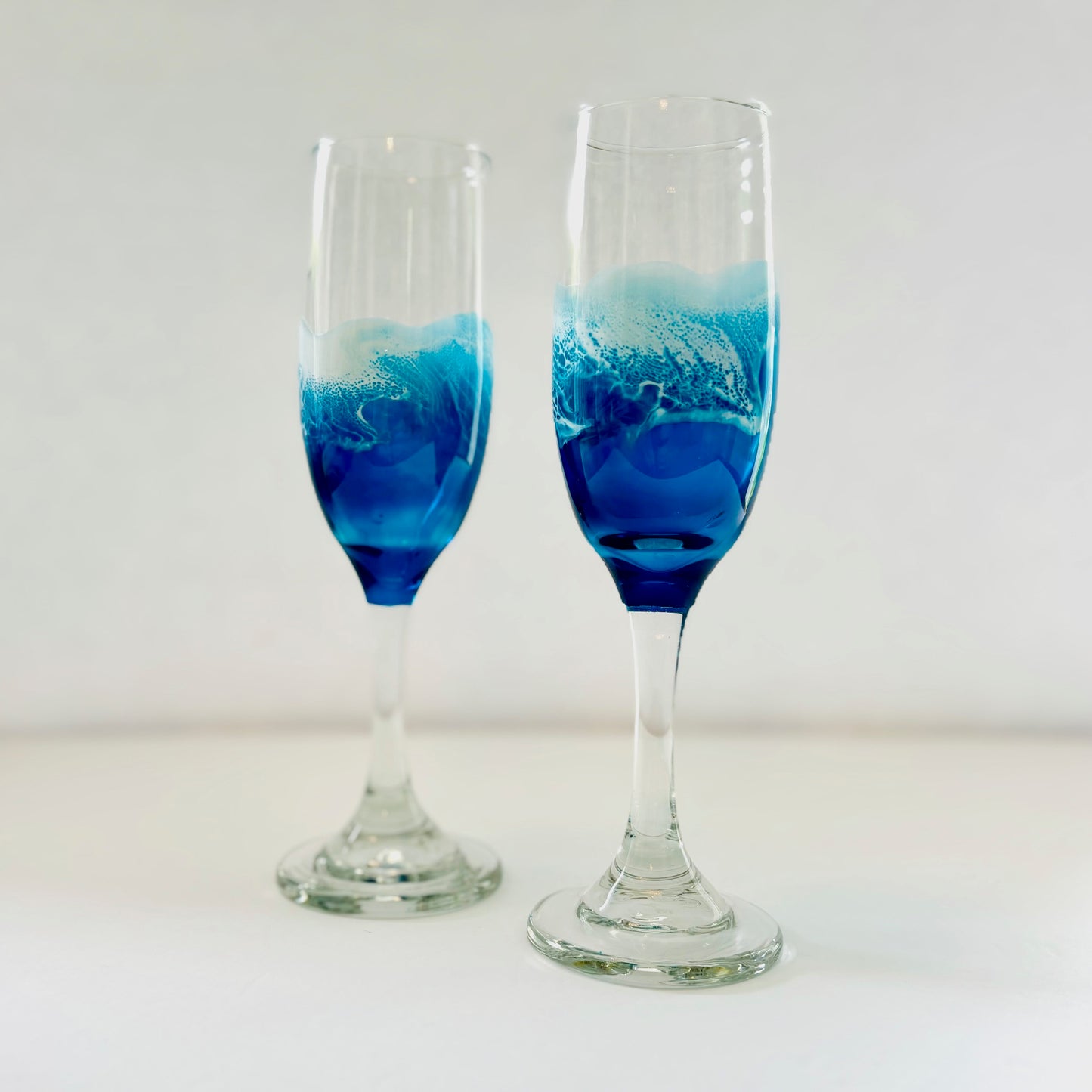 Pair of Ocean Inspired Champagne Glasses with Hand Painted Resin Waves